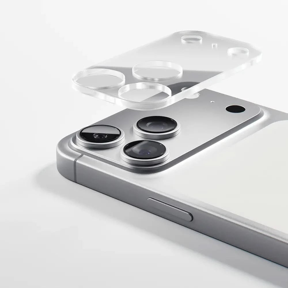 iPhone 17 camera lens protector by DROPGUYS, slightly raised above the phone camera lenses, clear plastic.
