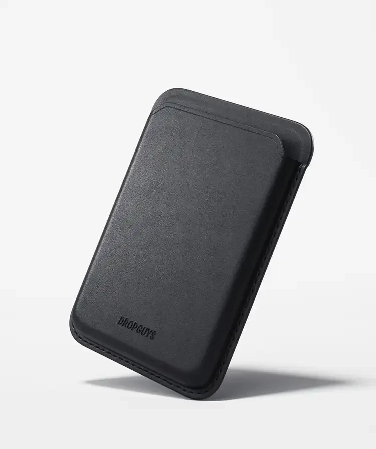 Black Magsafe wallet by DROPGUYS featuring a sleek, minimalist design and subtle stitching.
